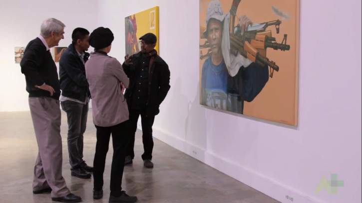 Mahdi Abdullah speaks to guests at Transmemorabilia. (Australia Plus)