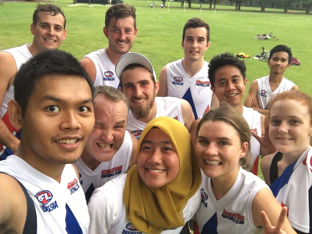 The Krakatoas. (Tim Flicker and the Krakatoas) A group of young Australians and Indonesians in sporting gear smile around the camera.